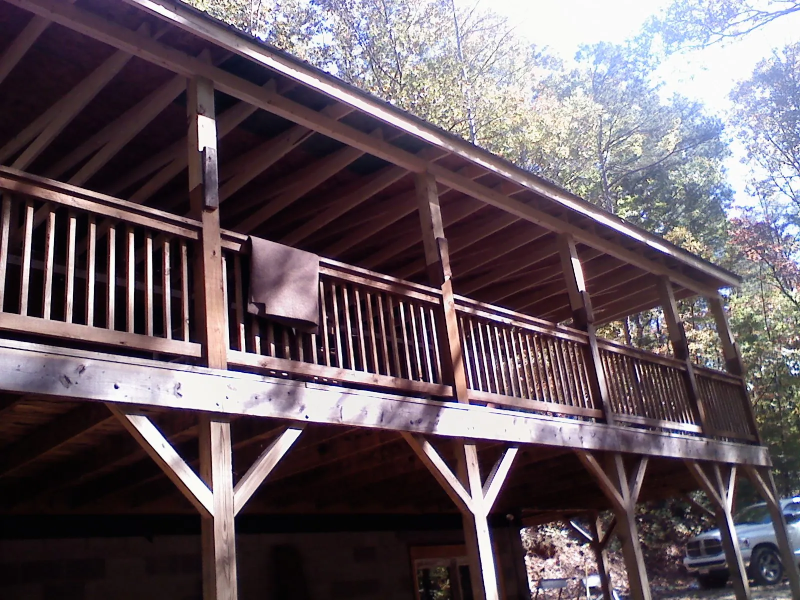 Timber framing under a new elevated porch and deck — Roof Leak Repair in Amanda by Roofing Brothers